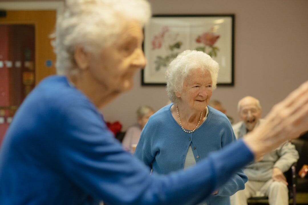 seniors doing gentle yoga
